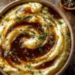 garlic mashed potatoes with gravy - featured image