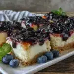 creamy blueberry cheesecake bars - featured image